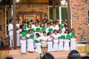 A group of children sings Vesak Hymns Saturday evening