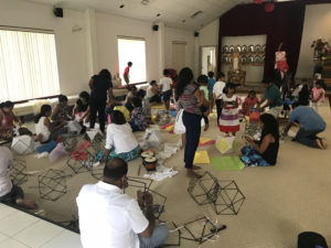 On Sunday 13th, a group of children and adults is making vesak lanterns.